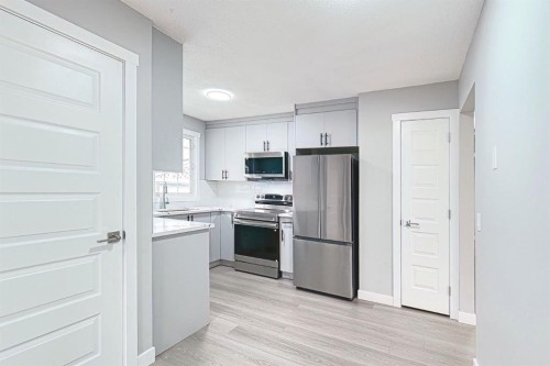 24 Rundleson Way Ne, Calgary, AB - Indoor Photo Showing Kitchen