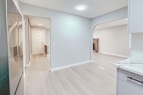 24 Rundleson Way Ne, Calgary, AB - Indoor Photo Showing Other Room