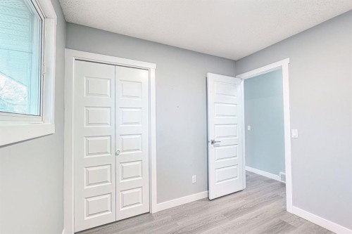 24 Rundleson Way Ne, Calgary, AB - Indoor Photo Showing Other Room