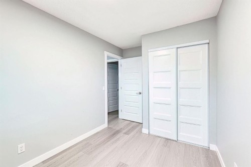 24 Rundleson Way Ne, Calgary, AB - Indoor Photo Showing Other Room