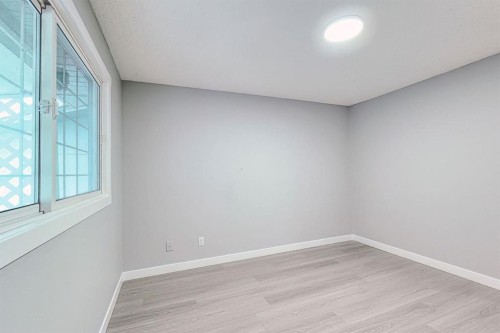 24 Rundleson Way Ne, Calgary, AB - Indoor Photo Showing Other Room