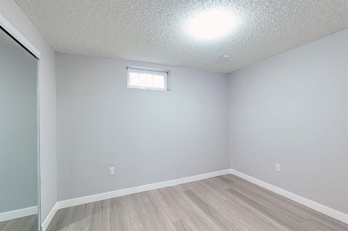 24 Rundleson Way Ne, Calgary, AB - Indoor Photo Showing Other Room