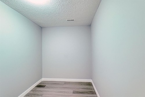 24 Rundleson Way Ne, Calgary, AB - Indoor Photo Showing Other Room