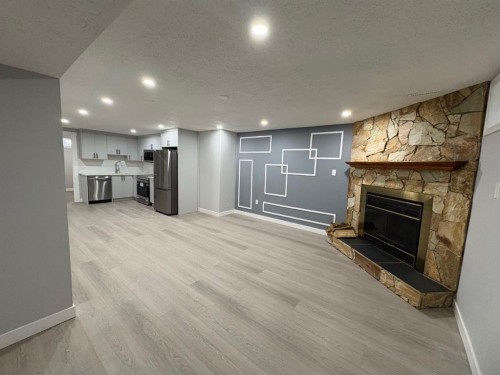 24 Rundleson Way Ne, Calgary, AB - Indoor With Fireplace