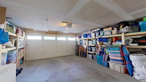 132 Legacy Point Se, Calgary, AB - Indoor Photo Showing Garage