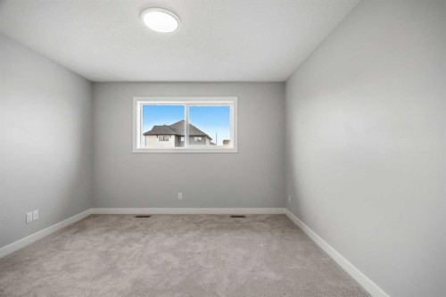 163 Keystone Creek Drive Ne, Calgary, AB - Indoor Photo Showing Other Room