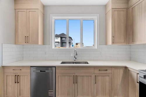 163 Keystone Creek Drive Ne, Calgary, AB - Indoor Photo Showing Kitchen With Double Sink