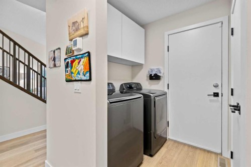 104 Hampshire Close Nw, Calgary, AB - Indoor Photo Showing Laundry Room