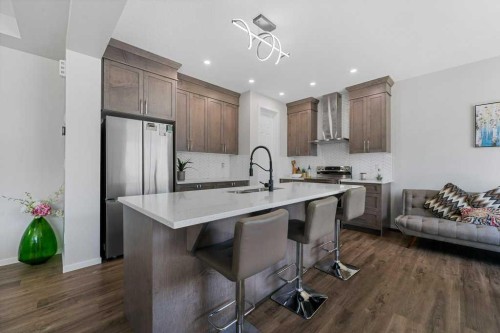 2091 Windbury Crescent Sw, Airdrie, AB - Indoor Photo Showing Kitchen With Upgraded Kitchen