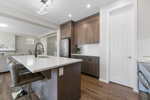 2091 Windbury Crescent Sw, Airdrie, AB - Indoor Photo Showing Kitchen With Upgraded Kitchen