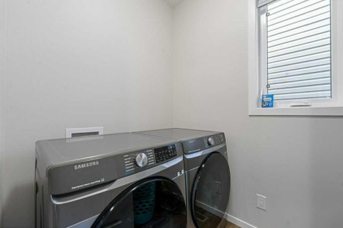 2091 Windbury Crescent Sw, Airdrie, AB - Indoor Photo Showing Laundry Room