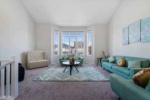 2091 Windbury Crescent Sw, Airdrie, AB - Indoor Photo Showing Living Room