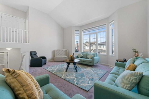 2091 Windbury Crescent Sw, Airdrie, AB - Indoor Photo Showing Living Room