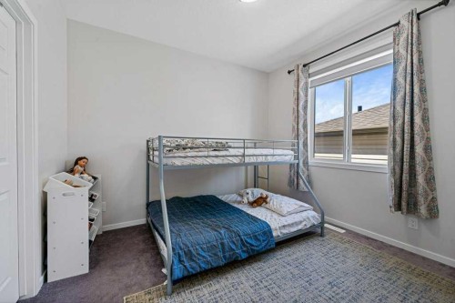 2091 Windbury Crescent Sw, Airdrie, AB - Indoor Photo Showing Bedroom