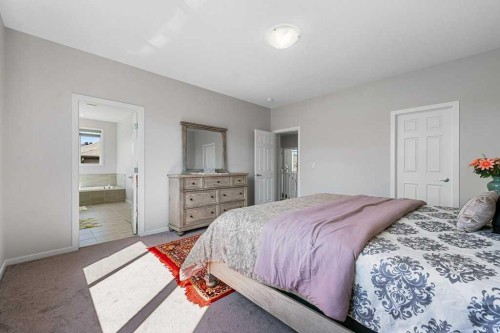 2091 Windbury Crescent Sw, Airdrie, AB - Indoor Photo Showing Bedroom