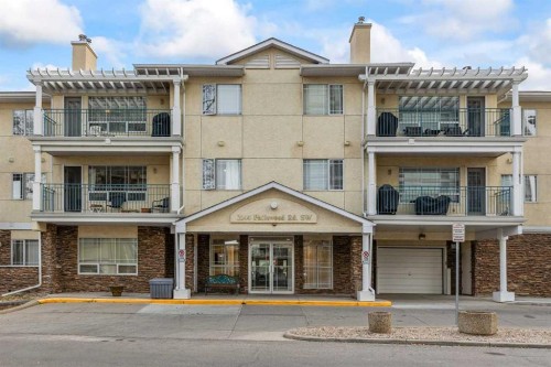 206-2144 Paliswood Road Sw, Calgary, AB - Outdoor With Balcony With Facade