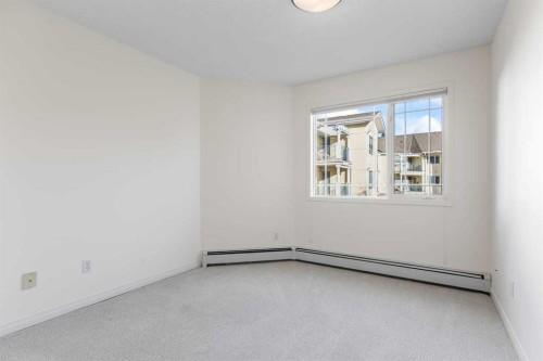 206-2144 Paliswood Road Sw, Calgary, AB - Indoor Photo Showing Other Room