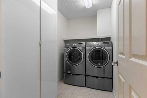 206-2144 Paliswood Road Sw, Calgary, AB - Indoor Photo Showing Laundry Room