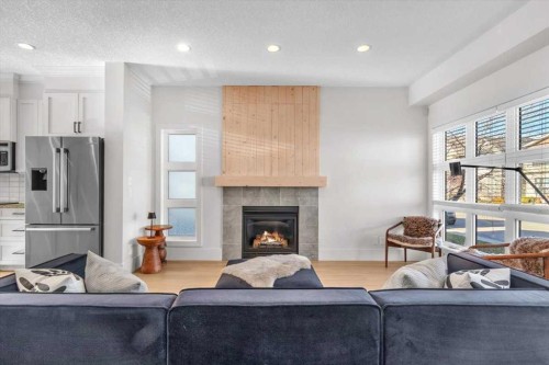 67 Walden Road, Calgary, AB - Indoor Photo Showing Living Room With Fireplace