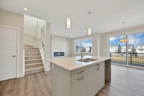 537 Chelsea Gardens, Chestermere, AB - Indoor Photo Showing Kitchen With Double Sink
