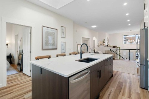 238 Somerglen Way Sw, Calgary, AB - Indoor Photo Showing Kitchen With Double Sink With Upgraded Kitchen