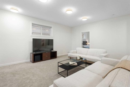 238 Somerglen Way Sw, Calgary, AB - Indoor Photo Showing Living Room