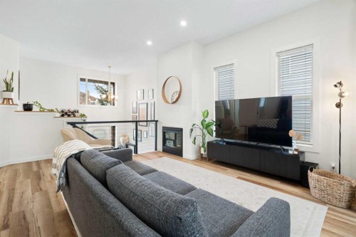 238 Somerglen Way Sw, Calgary, AB - Indoor Photo Showing Living Room