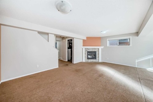 205 Panora Close Nw, Calgary, AB - Indoor With Fireplace