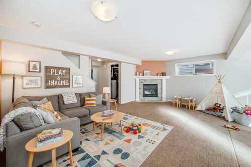 205 Panora Close Nw, Calgary, AB - Indoor Photo Showing Living Room With Fireplace