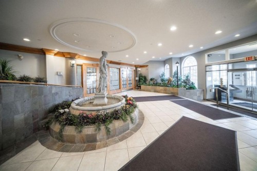 207-200 Lincoln Way Sw, Calgary, AB - Indoor Photo Showing Other Room