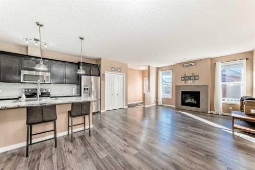 367 Auburn Crest Way Se, Calgary, AB - Indoor Photo Showing Other Room With Fireplace
