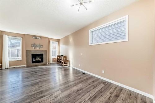 367 Auburn Crest Way Se, Calgary, AB - Indoor Photo Showing Living Room With Fireplace
