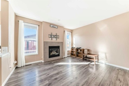 367 Auburn Crest Way Se, Calgary, AB - Indoor Photo Showing Living Room With Fireplace