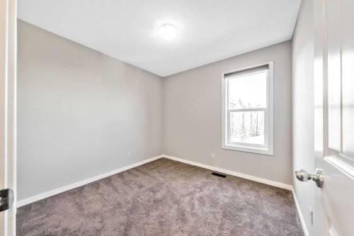 37 Marquis Common Se, Calgary, AB - Indoor Photo Showing Other Room