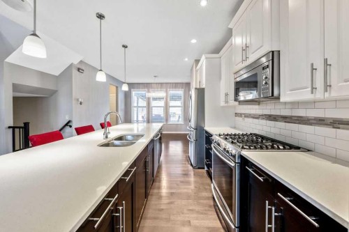 37 Marquis Common Se, Calgary, AB - Indoor Photo Showing Kitchen With Double Sink With Upgraded Kitchen
