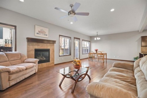 508 Everbrook Way Sw, Calgary, AB - Indoor Photo Showing Living Room With Fireplace