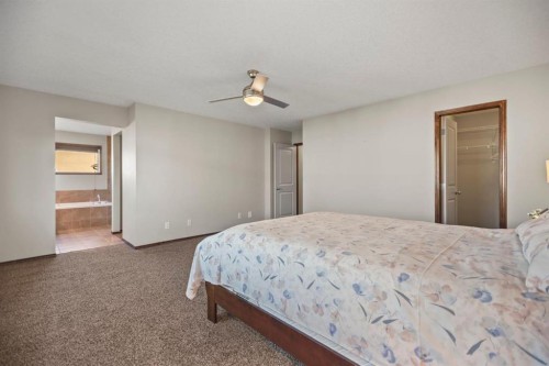 508 Everbrook Way Sw, Calgary, AB - Indoor Photo Showing Bedroom