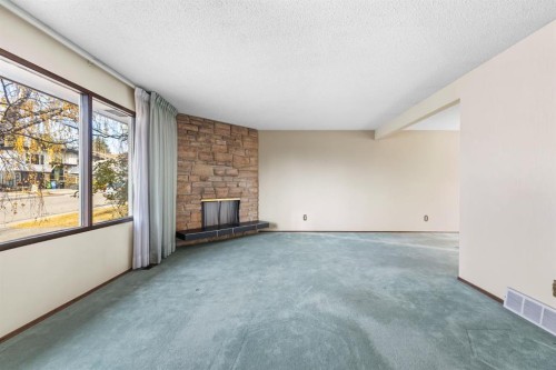 3375 Breton Close Nw, Calgary, AB - Indoor With Fireplace