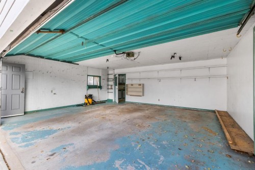 3375 Breton Close Nw, Calgary, AB - Indoor Photo Showing Garage