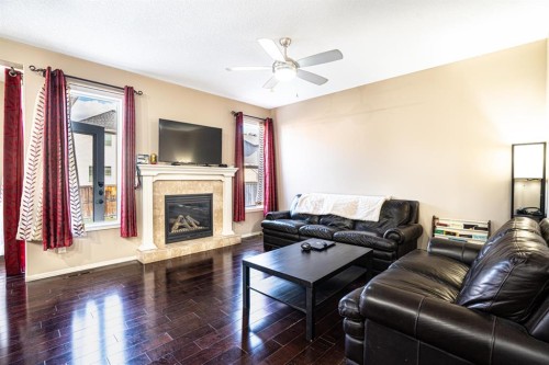 269 Skyview Shores Manor Ne, Calgary, AB - Indoor Photo Showing Living Room With Fireplace