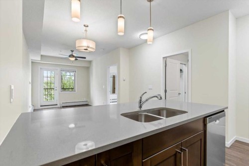 218-10 Mahogany Mews Se, Calgary, AB - Indoor Photo Showing Kitchen With Double Sink