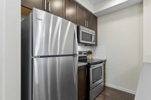218-10 Mahogany Mews Se, Calgary, AB - Indoor Photo Showing Kitchen With Stainless Steel Kitchen
