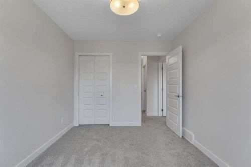 1489 Bayview Point Sw, Airdrie, AB - Indoor Photo Showing Other Room
