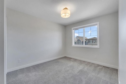 1489 Bayview Point Sw, Airdrie, AB - Indoor Photo Showing Other Room