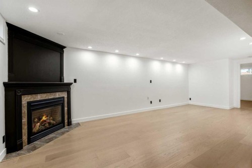 4703 40 Avenue Sw, Calgary, AB - Indoor With Fireplace