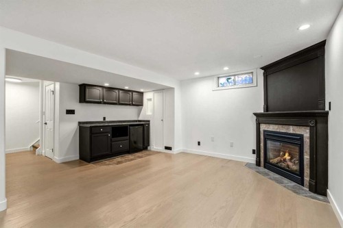 4703 40 Avenue Sw, Calgary, AB - Indoor With Fireplace