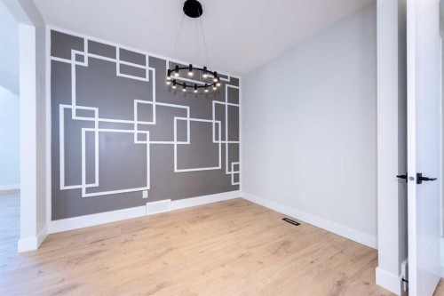 22 Cimarron Estates Gate, Okotoks, AB - Indoor Photo Showing Other Room
