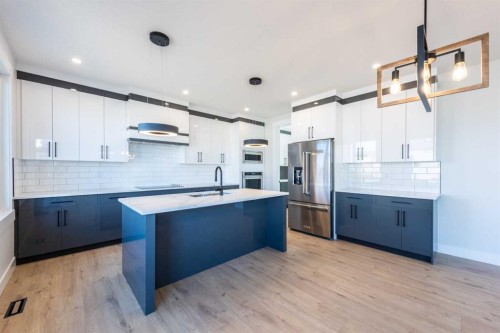 22 Cimarron Estates Gate, Okotoks, AB - Indoor Photo Showing Kitchen With Upgraded Kitchen