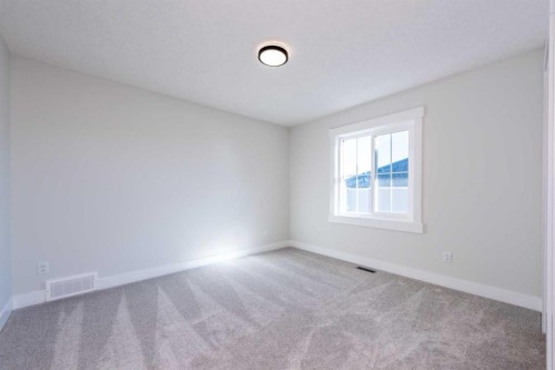 22 Cimarron Estates Gate, Okotoks, AB - Indoor Photo Showing Other Room