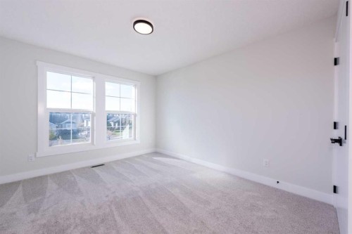 22 Cimarron Estates Gate, Okotoks, AB - Indoor Photo Showing Other Room